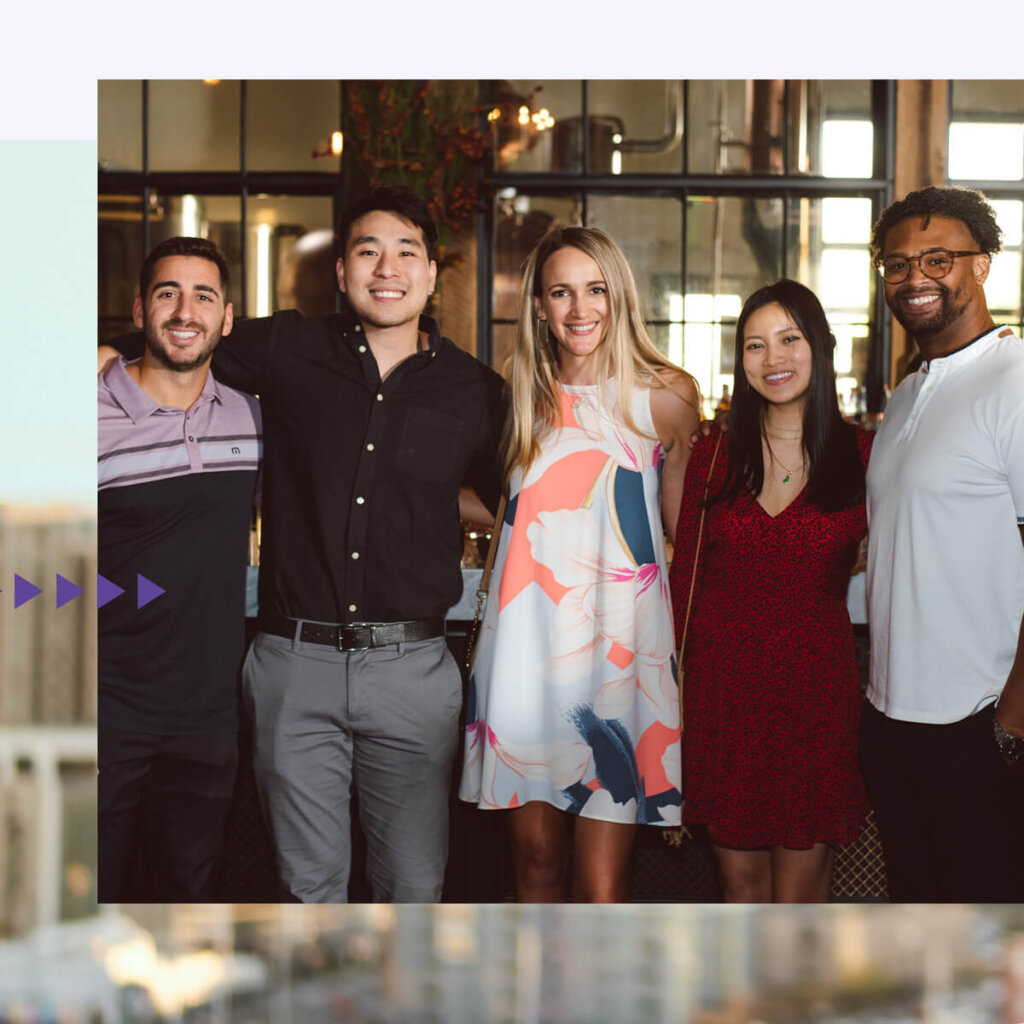 young financial advisors posing for photo