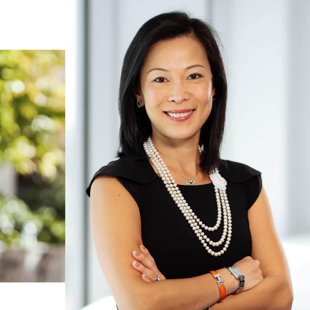 financial advisor in black shirt with folded arms